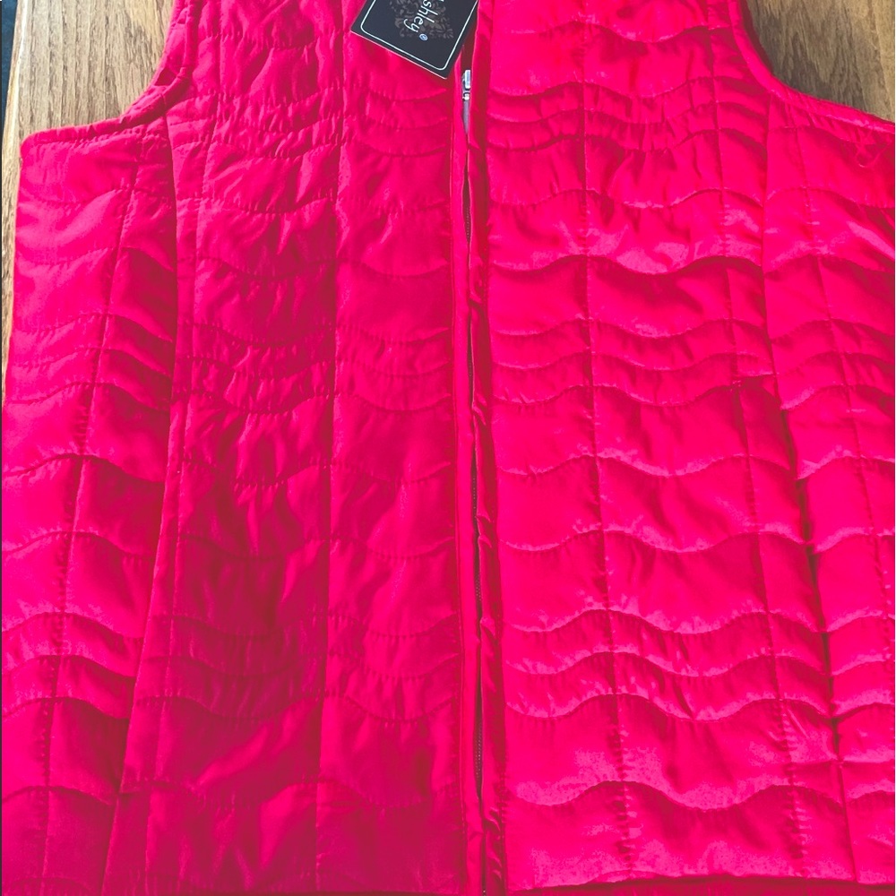 Brand new red vest with tags